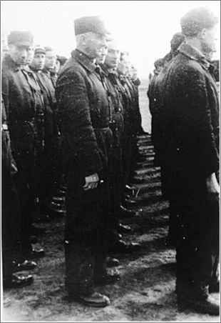 Roll call of the camp Jewish police. Westerbork transit camp, the Netherlands, 1942 or 1943